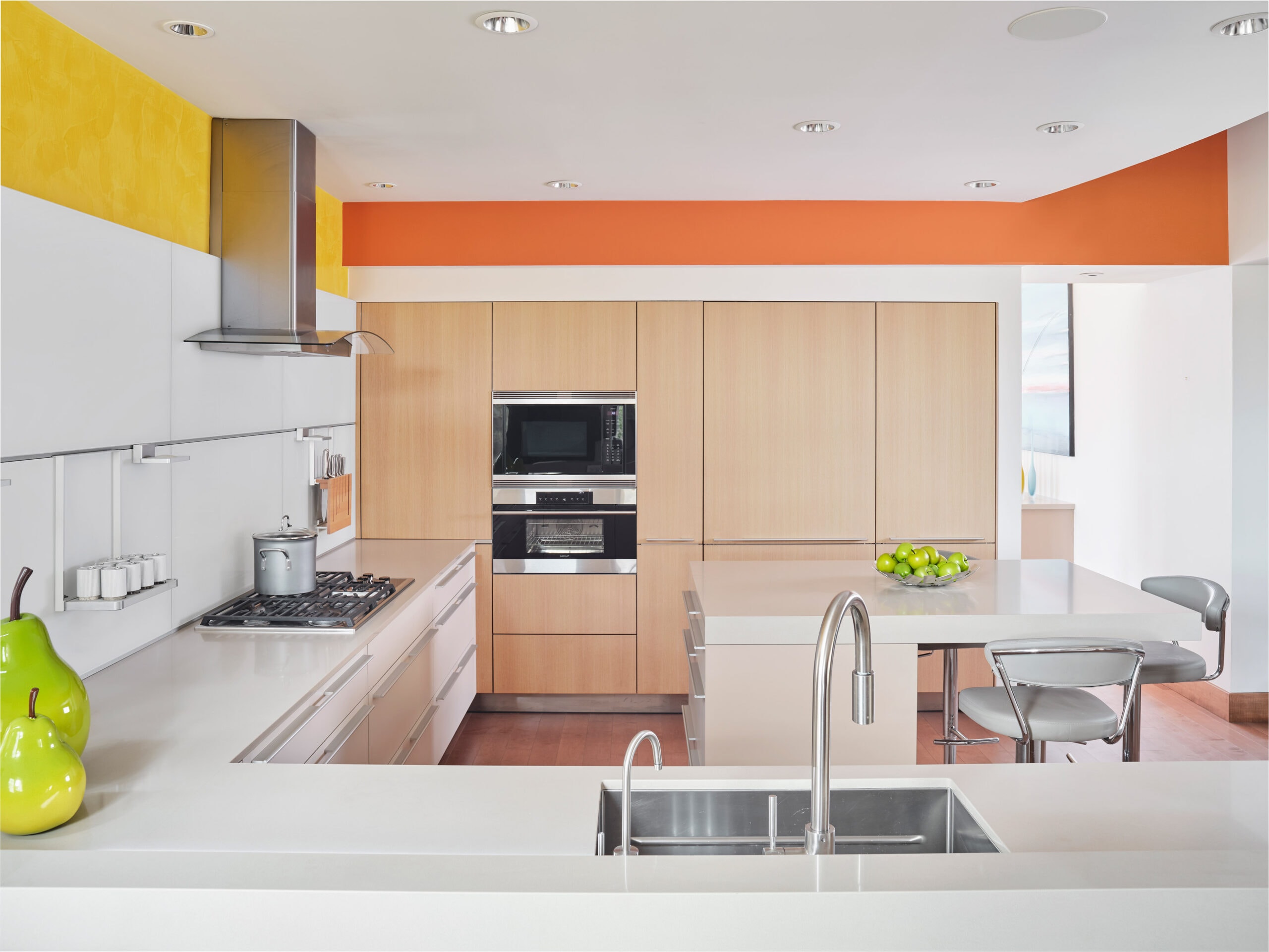 Sleek Bulthaup kitchen with colorful accent paint